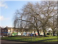 Roundabout and shops at Tarbock Road