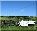 Direction signs on the A29 at the Dundrum Road junction