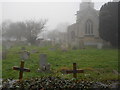 TF1505 : St. Benedict's Church and churchyard, Glinton, on a foggy day by Paul Bryan