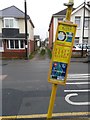 SZ1392 : West Southbourne: footpath H11 and a leaning bus stop sign by Chris Downer