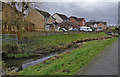 Houses next to Whetstone Brook, Whetstone