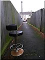 Tuckton: swivelling chair on footpath I22