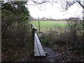 Footpath over bridge towards the edge of housing at Partridge Green