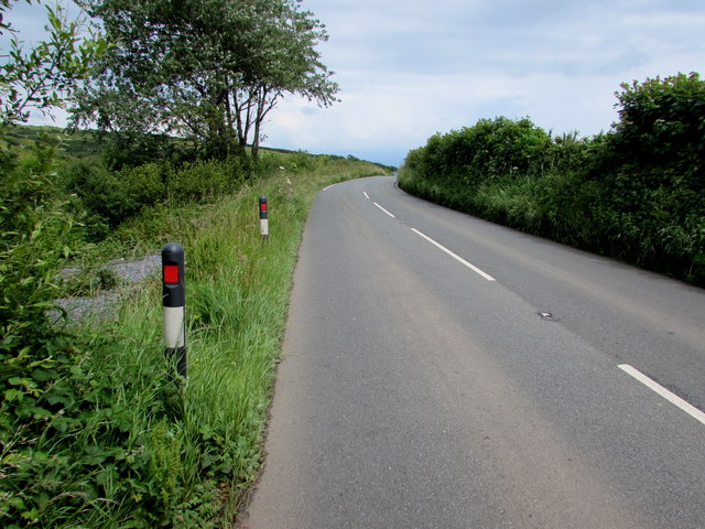 Black, white and red roadside markers near Penally