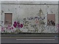 NZ2563 : Graffiti on former industrial site, Gateshead riverside by Graham Robson