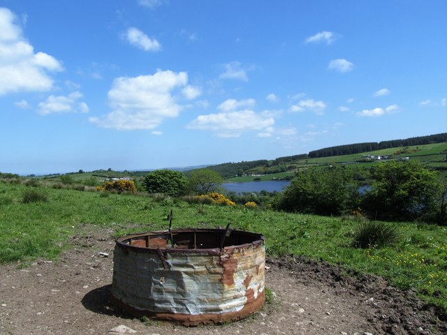 Cattle feeding trough above Tullynawood Lake