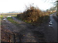 Muddy track into field from Furners Lane