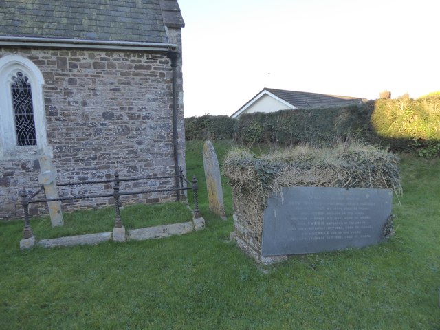 An overgrown table tomb, Puddington churchyard
