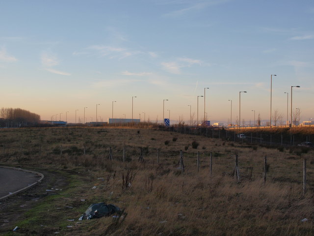 Disused land between the railway and motorway