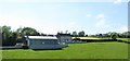 Neighbouring farmhouses on the west side of the A3