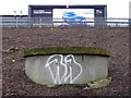 Concrete thingy and digital billboard