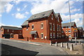 Houses of Recreation Grove and Brown Lane East at Top Moor Side end