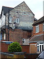 Ghost writing on a gable wall