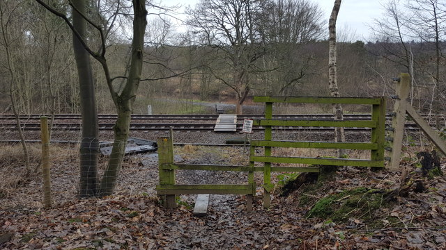 Stile on footpath that crosses Carlisle railway at Farnley Banks