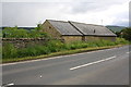 Farm buildings on south side of A684