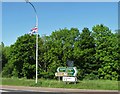 Direction signs and the Union Flag at the B3 junction on the A28 at Markethill