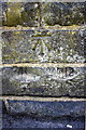 Benchmark on parapet of bridge on Benson Street