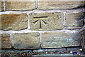 Benchmark on wall of Chapeltown Road