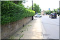 Wall of Chapeltown Road near Louis Street junction