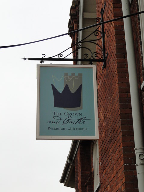 Hanging sign for 'The Crown and Castle' hotel