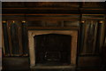 TQ3182 : View of a fireplace in the Charterhouse by Robert Lamb