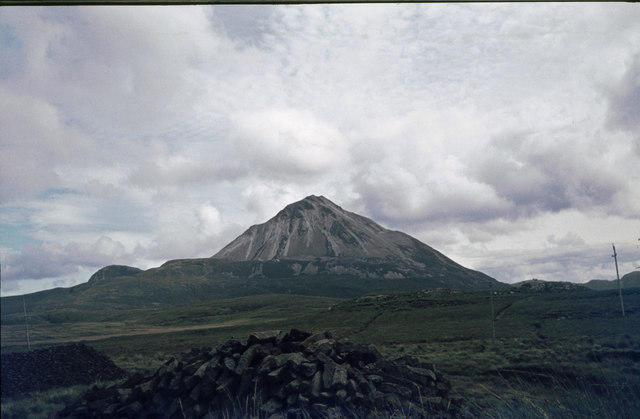 Peat piles with Mt. Errigal in the back © Klaus Liphard :: Geograph Ireland