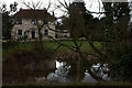 House and pond on East Road