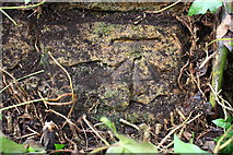 SP2607 : Benchmark on wall at junction of road and track south of Shilton by Roger Templeman