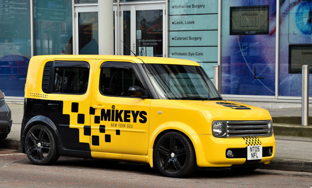 yellow nissan cube