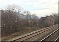 View from a Cardiff-Swansea train - old bridge abutment