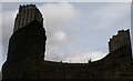 View of two of the Barbican Towers towering above the ruins of the London Wall from the area near the Barbican Estate #2