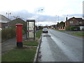 Elizabeth II postbox and telephone box  on Camborne Drive, Horeston Grange