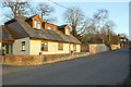 The Lodge, #24 High Street and roadside brick walls