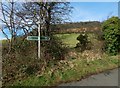 Signpost beside a path to Milton Brae