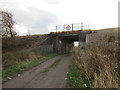 Approaching the railway bridge