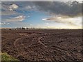 NH7773 : Recently ploughed field overlooking Nigg Bay by valenta