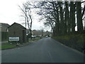 B6107 Moor Lane at Netherthong village boundary