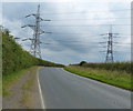 TA0917 : Power lines crossing the A1077 Thornton Road by Mat Fascione