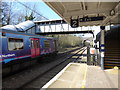 A train leaves Gordon Hill station