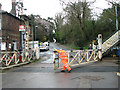 Closing the crossing gates in Station Road, Brundall