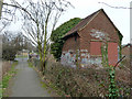 Small shuttered building