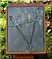 Metal plaque on a mile marker on the Marriott