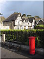 Pillarbox and house in Penzance