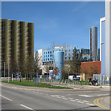 TL4654 : Coloured buildings on the Cambridge Biomedical Campus by John Sutton