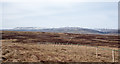 NY8718 : Fence across moorland by Trevor Littlewood