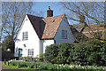 TL5646 : Green Lane cottage by M H Evans