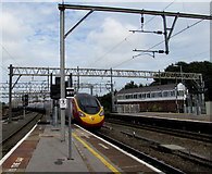 SJ8989 : Virgin Pendolino leaves Stockport railway station by Jaggery