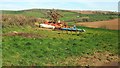 SX1658 : Farm machinery above the Trebant Water valley by Derek Harper