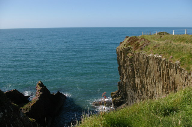 Coast path above overhanging cliff, near Aber Fforest