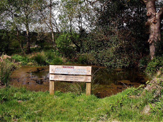 Pond and sign at Red Barn Nature Park, Sedlescombe Street